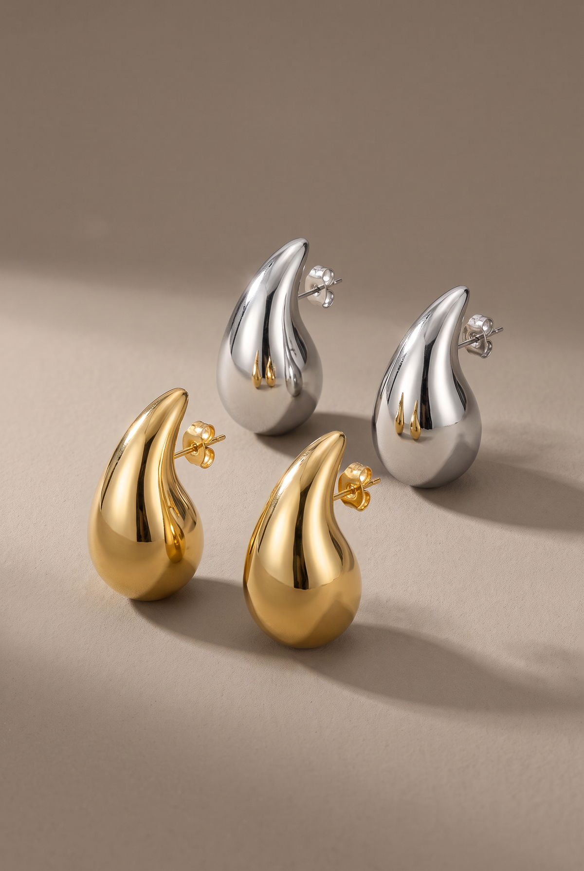 DropIQ chunky teardrop drop studs in gold and silver
